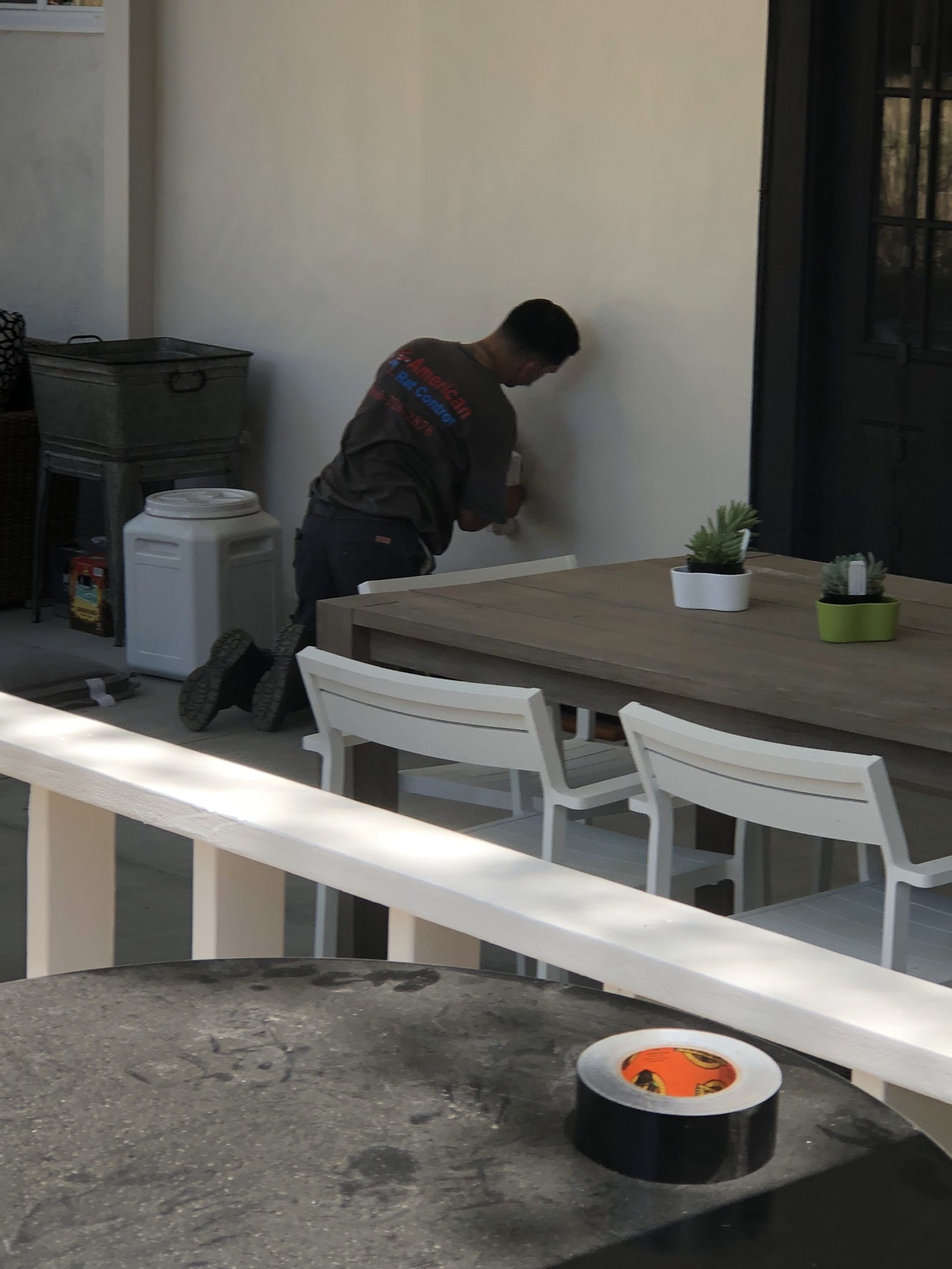 American Rat Control technicians installing a rat proof dryer vent